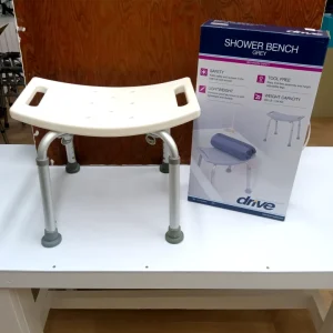Drive Medical Safety Shower Tub Chair with drainage seat, non-slip feet, and height-adjustable legs for safe bathing.