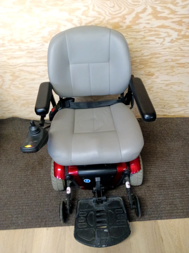 Jet 3 Ultra Power Wheelchair with deluxe high-back seat, joystick control, Active-Trac suspension, and solid drive tires for indoor and outdoor mobility.